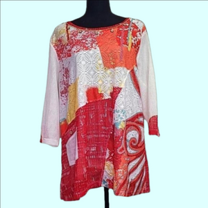 Multiples long sleeved pattern top. White lining. Size PXL.